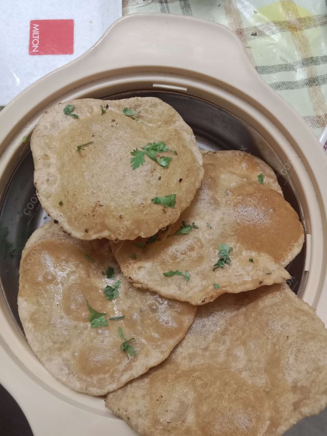 Delicious Pooris & Bedmis prepared by COOX