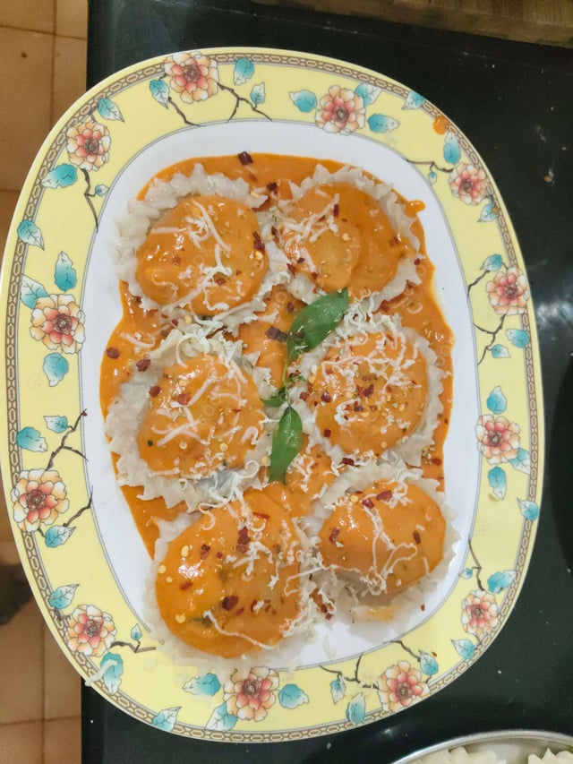 Delicious Ravioli in Pink Sauce prepared by COOX