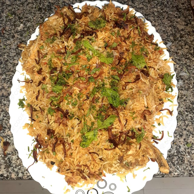 Tasty Chicken Biryani cooked by COOX chefs cooks during occasions parties events at home