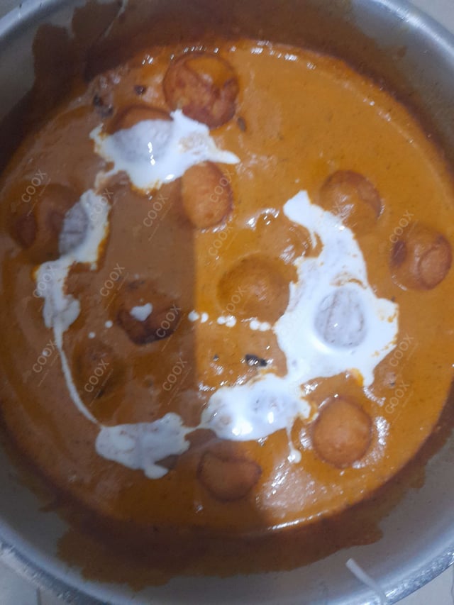 Delicious Malai Kofta (Orange Gravy) prepared by COOX