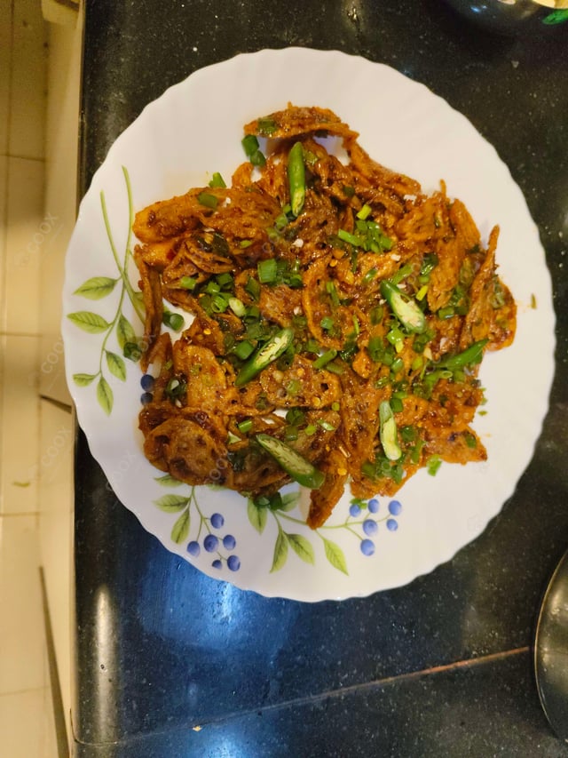 Delicious Chilli Lotus Stem prepared by COOX