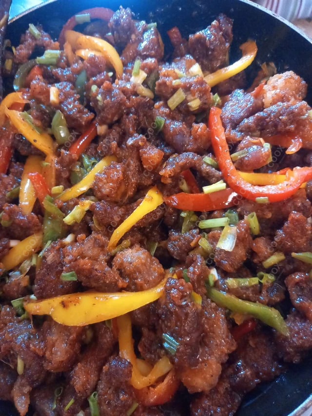 Delicious Crispy Chilli Lamb prepared by COOX