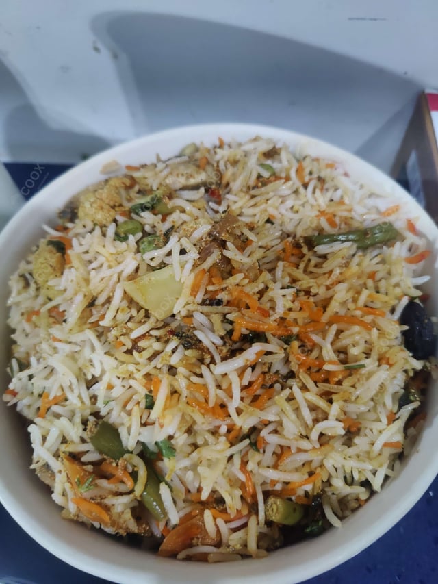Delicious Veg Biryani prepared by COOX