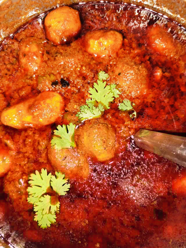 Delicious Dum Aloo prepared by COOX