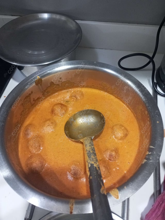 Delicious Malai Kofta (Orange Gravy) prepared by COOX