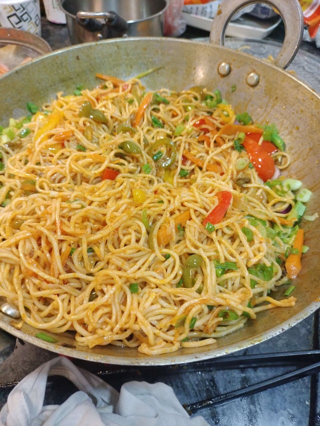 Delicious Chilli Garlic Noodles prepared by COOX