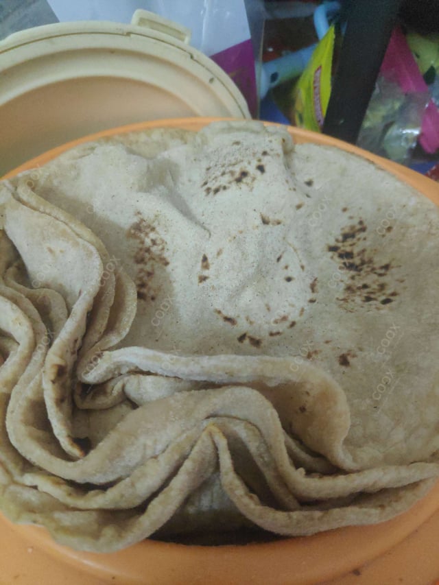 Delicious Tawa Rotis prepared by COOX