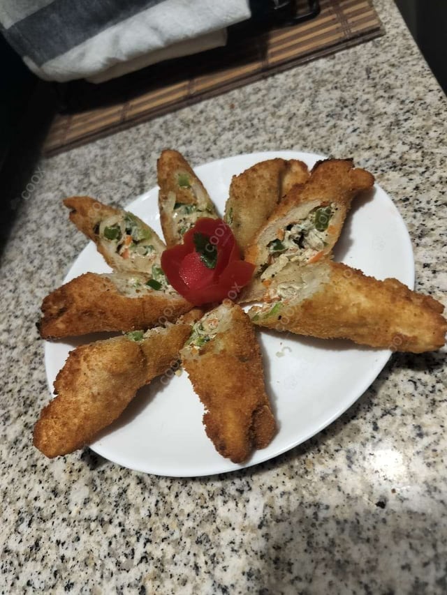 Delicious Dahi ke Sholey prepared by COOX