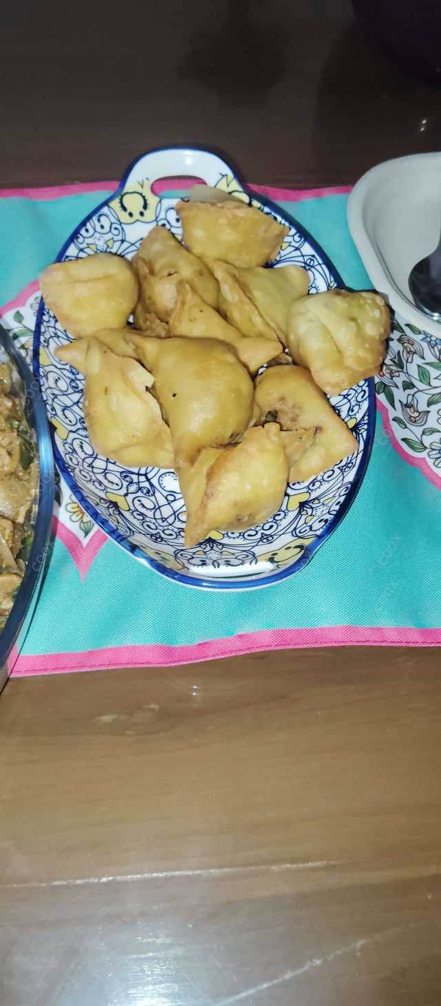 Delicious Mini Samosas prepared by COOX