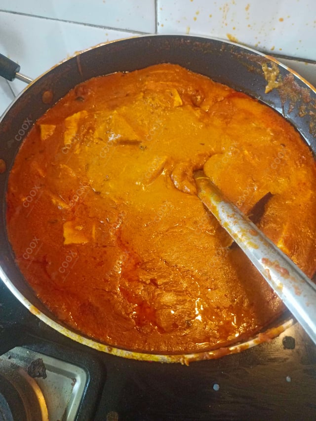 Delicious Paneer Butter Masala prepared by COOX