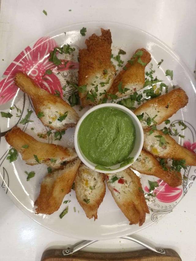 Delicious Dahi ke Sholey prepared by COOX