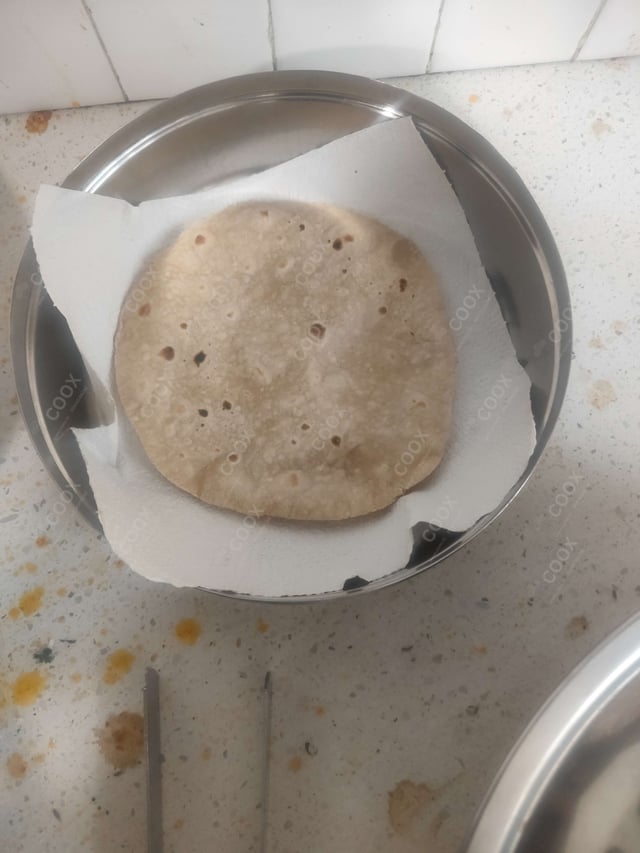 Delicious Tawa Rotis prepared by COOX