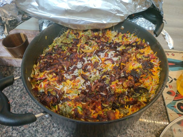 Delicious Chicken Biryani prepared by COOX