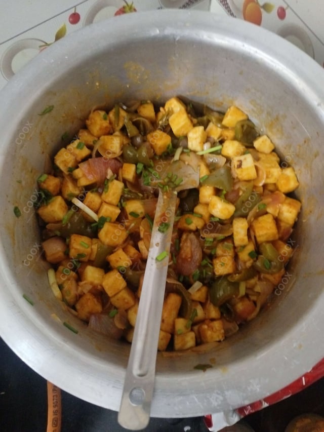 Delicious Chilli Paneer (Dry) prepared by COOX