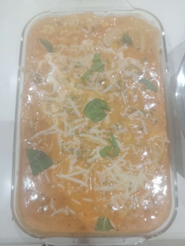 Delicious Ravioli in Pink Sauce prepared by COOX