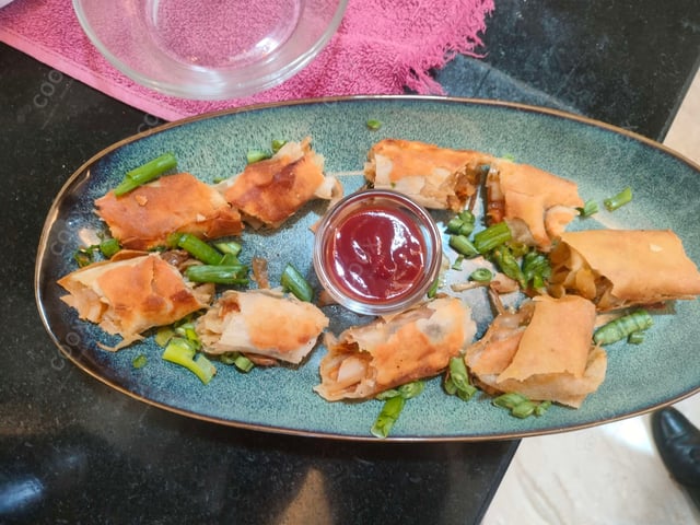 Delicious Veg Spring Rolls prepared by COOX