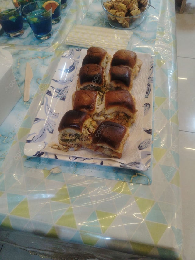 Delicious Mini Veg Burgers prepared by COOX
