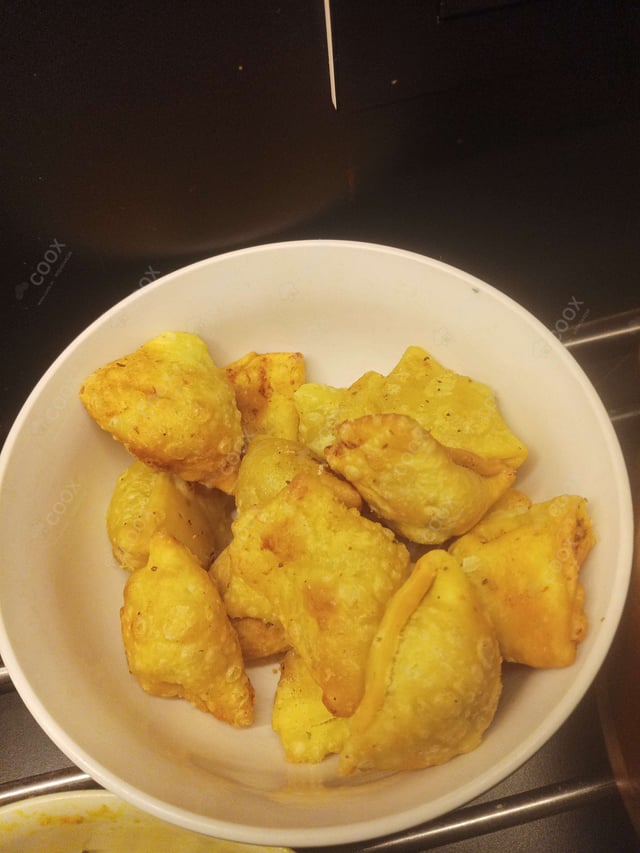 Delicious Mini Samosas prepared by COOX