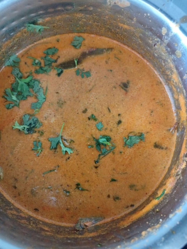 Delicious Dum Aloo prepared by COOX