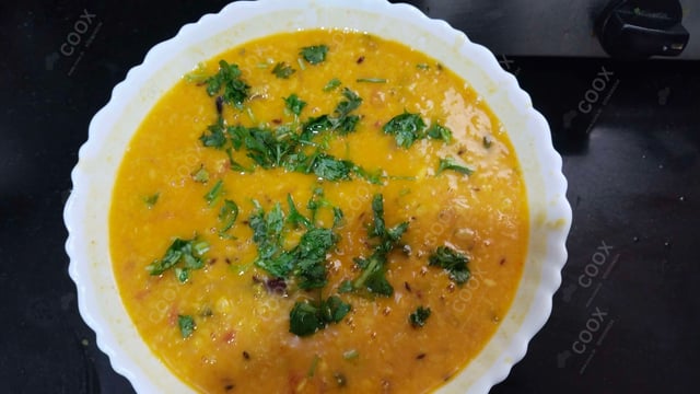 Delicious Dal Tadka prepared by COOX