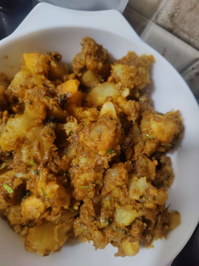 Delicious Jeera Aloo prepared by COOX