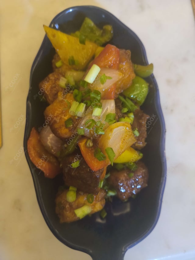 Delicious Chilli Paneer (Dry) prepared by COOX