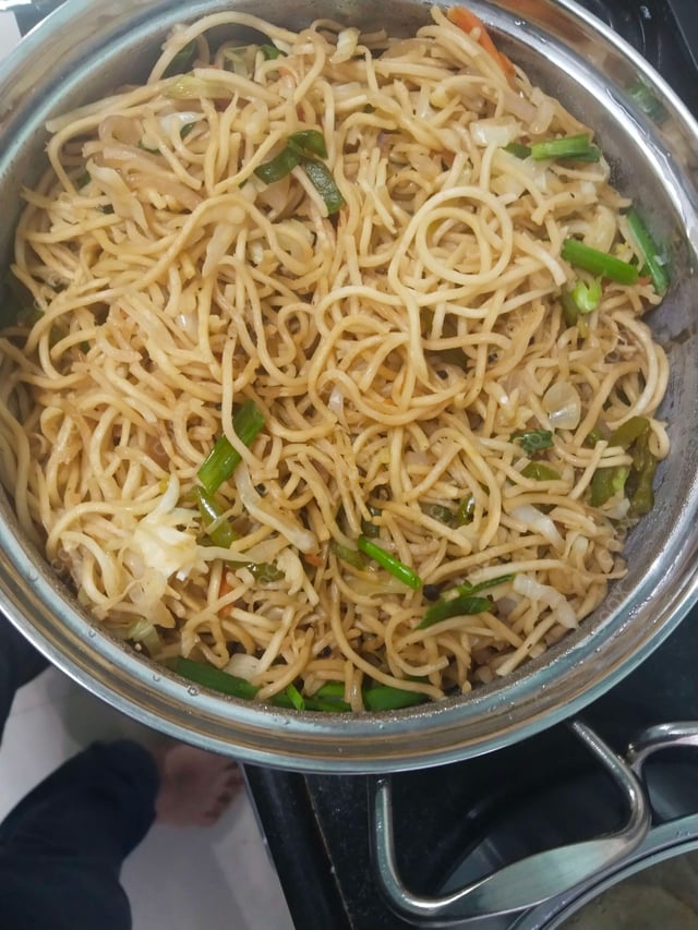 Delicious Veg Hakka Noodles prepared by COOX