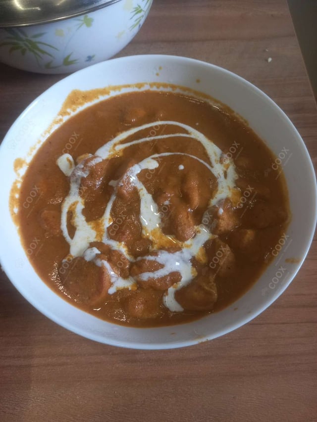 Delicious Butter Chicken prepared by COOX