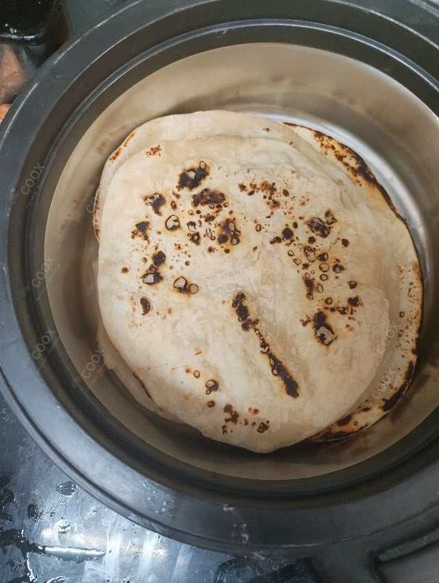 Delicious Naan (Butter / Garlic) prepared by COOX