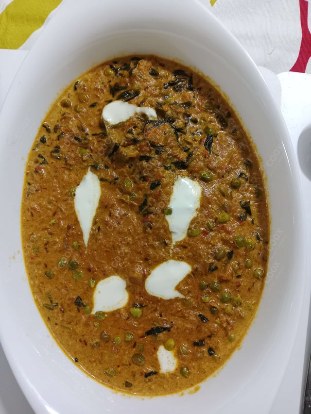 Delicious Methi Matar Malai prepared by COOX