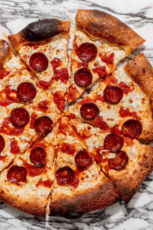 Delicious Pepperoni Pizza prepared by COOX