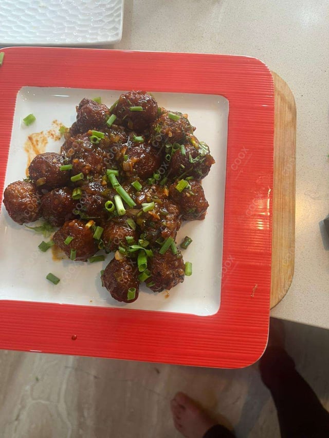Delicious Veg Manchurian (Dry) prepared by COOX