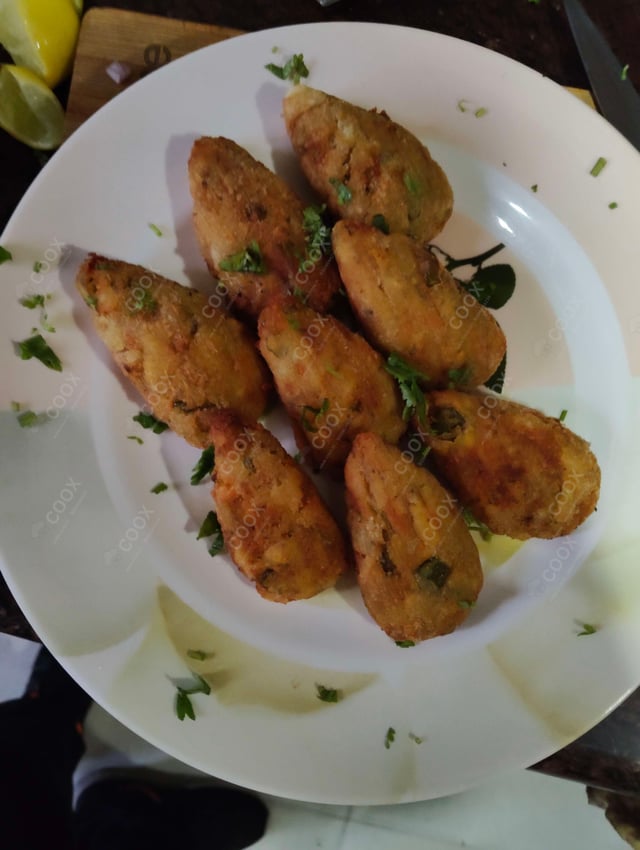 Delicious Veg Cutlets prepared by COOX