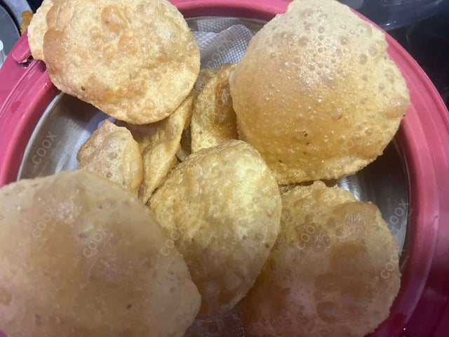 Delicious Pooris & Bedmis prepared by COOX