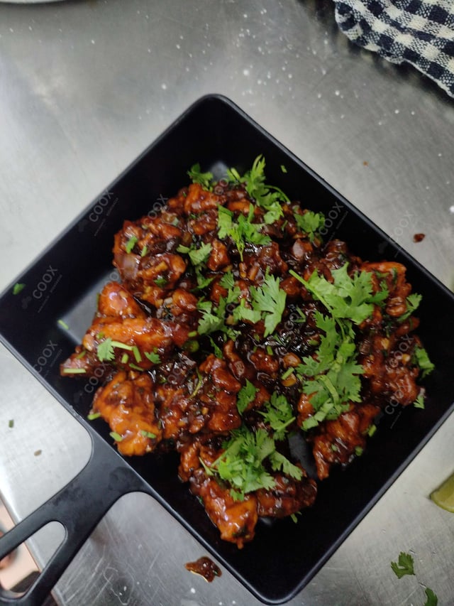 Delicious Veg Manchurian (Dry) prepared by COOX