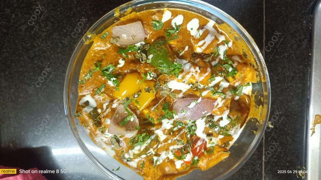 Delicious Mutton Rogan Josh prepared by COOX