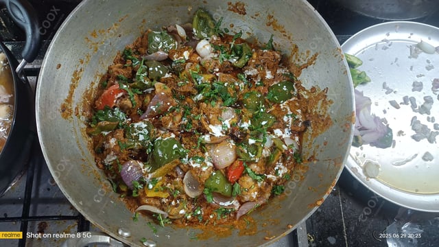Delicious Kadhai Paneer prepared by COOX