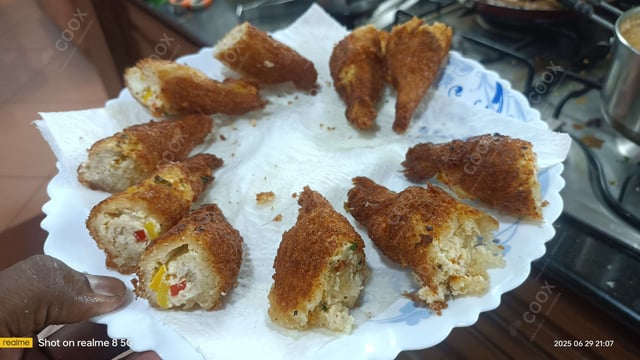 Delicious Dahi ke Sholey prepared by COOX