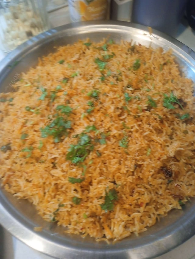 Delicious Schezwan Fried Rice prepared by COOX