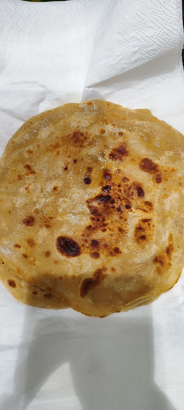 Delicious Lachha Paranthas prepared by COOX