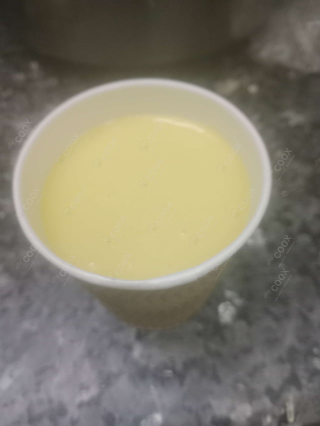 Delicious Mango Milkshake prepared by COOX