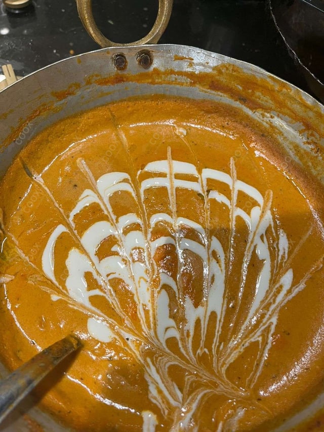 Delicious Malai Kofta (Orange Gravy) prepared by COOX