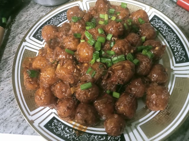 Delicious Veg Manchurian (Dry) prepared by COOX