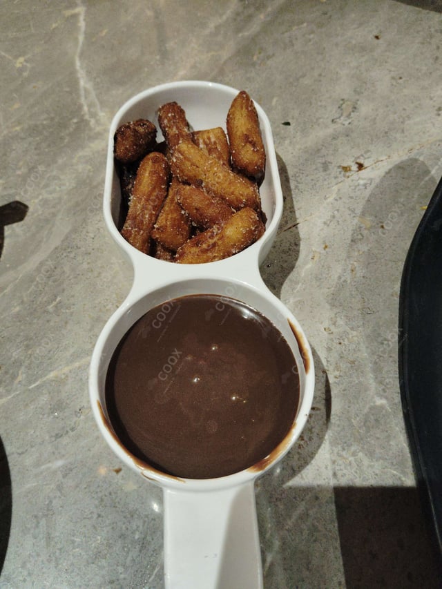 Delicious Churros prepared by COOX