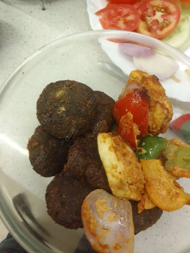 Delicious Paneer Tikka prepared by COOX