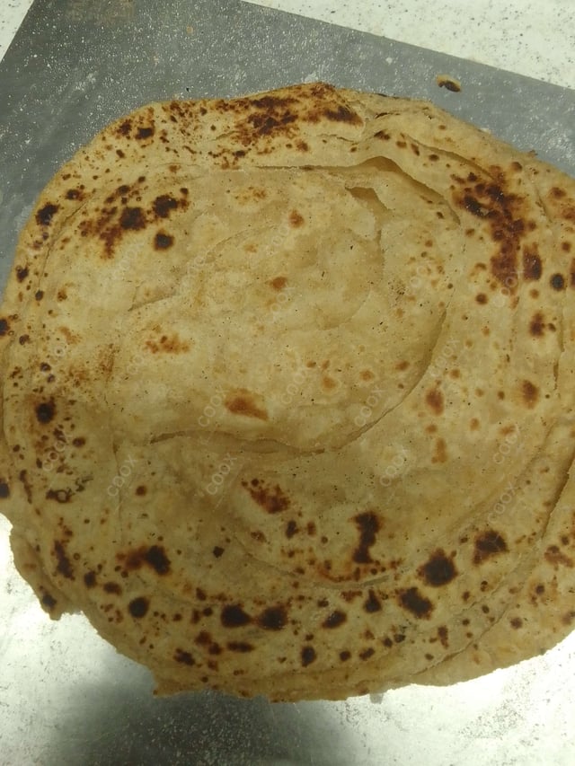 Delicious Lachha Paranthas prepared by COOX