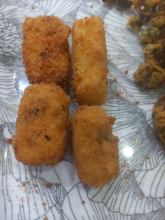 Delicious Dahi ke Sholey prepared by COOX