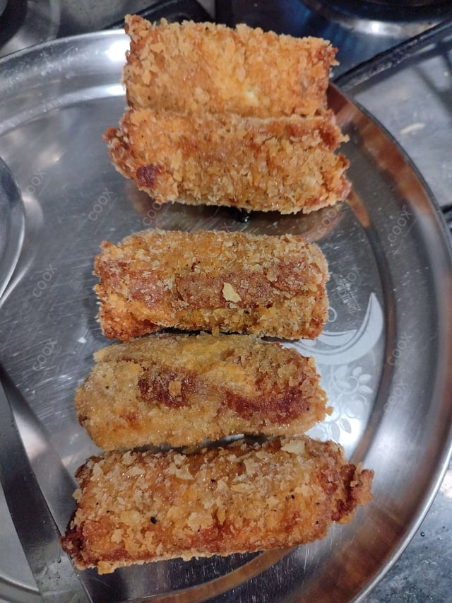 Delicious Dahi ke Sholey prepared by COOX