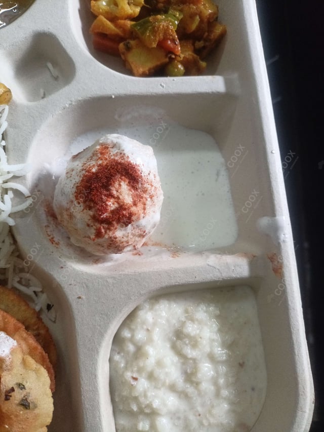 Delicious Dahi Bhalla prepared by COOX