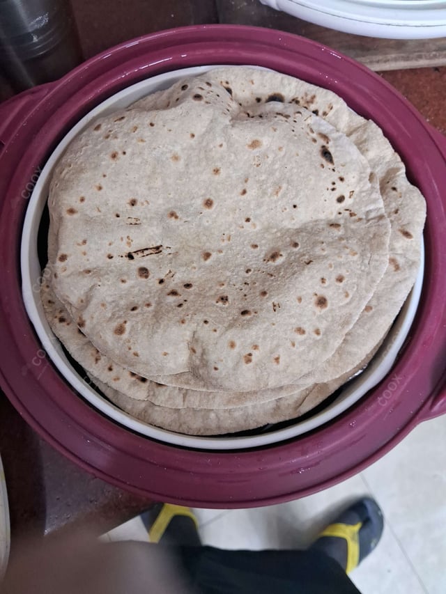 Delicious Tawa Rotis prepared by COOX